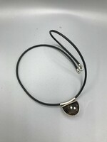 Polished smoky quartz silver 925 socket sliding pendant marked 925 silver end on black rubber thread