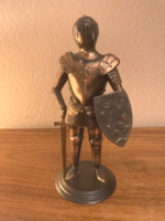 Knight's armor made of miniature red copper plate