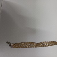 For sale, the braided women's bracelet shown in the pictures is in good condition....