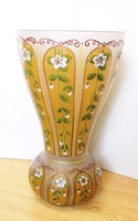 The Bohemia vase is a specialty. Banded with floral enamel painting