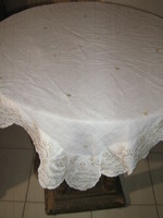 Beautiful white light filigree tablecloth with madeira edge
