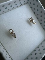 14K gold earrings with a brilliant small stone