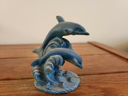 Ceramic dolphin statue