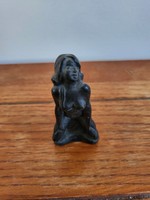 Female figure sculpture