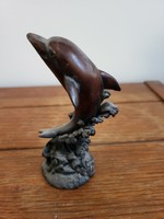 Dolphin figure sculpture