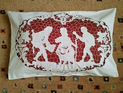 An old decorative cushion cover with a hinged scene