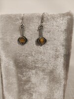 Interesting silver earrings with a tiger's eye stone