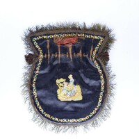 Silk theater bag with embroidery and fringe