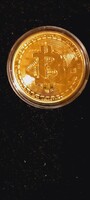 Bitcoin - gold colored coin in flawless capsule. HUF 700/pc