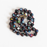 Antique necklace with colorful glass beads - Murano millefiori beads kneaded in black glass paste