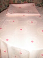 Damask bedding with large and small pillows embroidered in a beautiful fabric