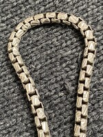 Chain with a special eye grinding