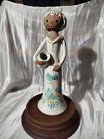 Painted ceramic statue / girl with a jug