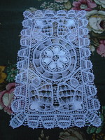 47 X 29 cm. Hand-stitched lace tablecloth, centerpiece, etc.