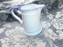 Creamy porcelain jug