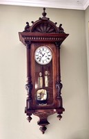 Short pendulum antique wall clock circa 1880