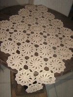 Beautiful hand-crocheted boat-shaped floral lace tablecloth