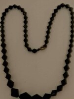 Polished black glass pearl necklace