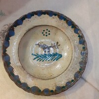 Old folk earthenware plate