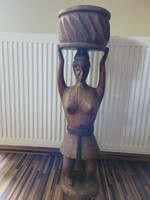Large carved African wooden female statue flower stand.