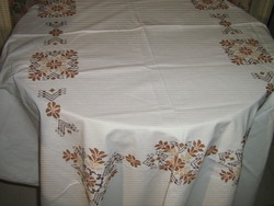 Beautiful elegant embroidered white filigree tablecloth