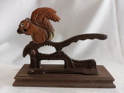 Antique metal squirrel nutcracker with wooden base