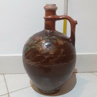 Old folk earthenware jug