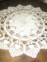 Beautiful round lace tablecloth hand-crocheted in round