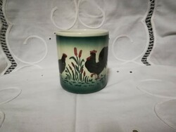 Granite mug with rooster pattern