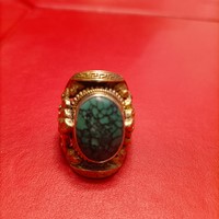 Huge silver ring with green stones