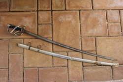 Old sword with decorative blade