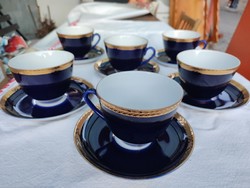 Russian Lomonosov teacups, in display case, cobalt blue, gold-plated