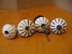 Old porcelain drawer knobs in one