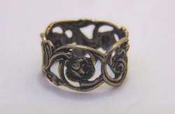 Antique secession-style silver wedding ring in a circle with a rose flower tendril motif wedding ring