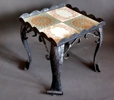 Wrought iron table with handmade tiles. Negotiable!