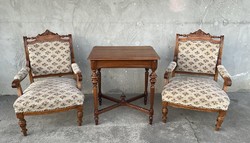 Pewter carved armchairs, armchairs paired with a table