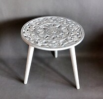 Round small table carved from mango wood is negotiable
