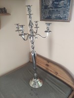 Huge copper 5-branch candle holder for a castle in a dining room for a wedding