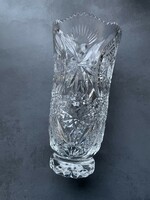 An elegant, very well-shaped crystal vase with nicely curved sides, a zigzag mouth, and a base