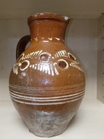 Large brown ceramic jug