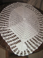 Beautiful white antique hand-crocheted boat-shaped tablecloth