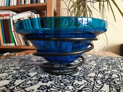 Turquoise glass bowl, offering, on a spiral iron base.