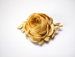 Rose brooch carved from old, exotic bone.