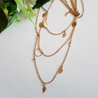 New, gold-colored, 3-row bisque necklace