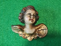 Antique putto - angel head - in baroque style