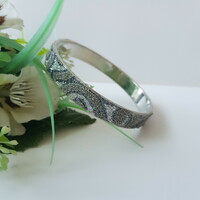 New, silver-grey, shiny bracelet, bangle