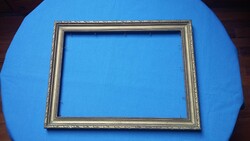 Old gilded wooden picture frame