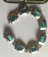 Silver bracelet with opal blue glass stone