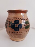 Old painted flower-patterned glazed mug