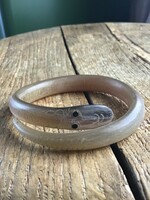Horn bracelet in the shape of an old snake